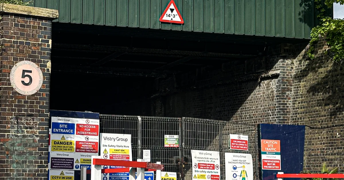 A Vistry Group construction site entrance with the company's own safety signage, Rochester Riverside development, Kent.